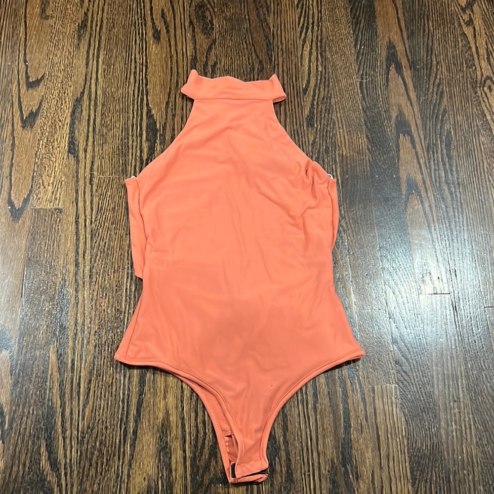 Never worn coral body suit